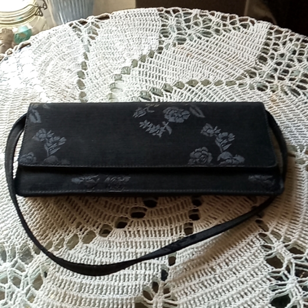 Small Black satin evening purse or clutch. Very nice and clean.